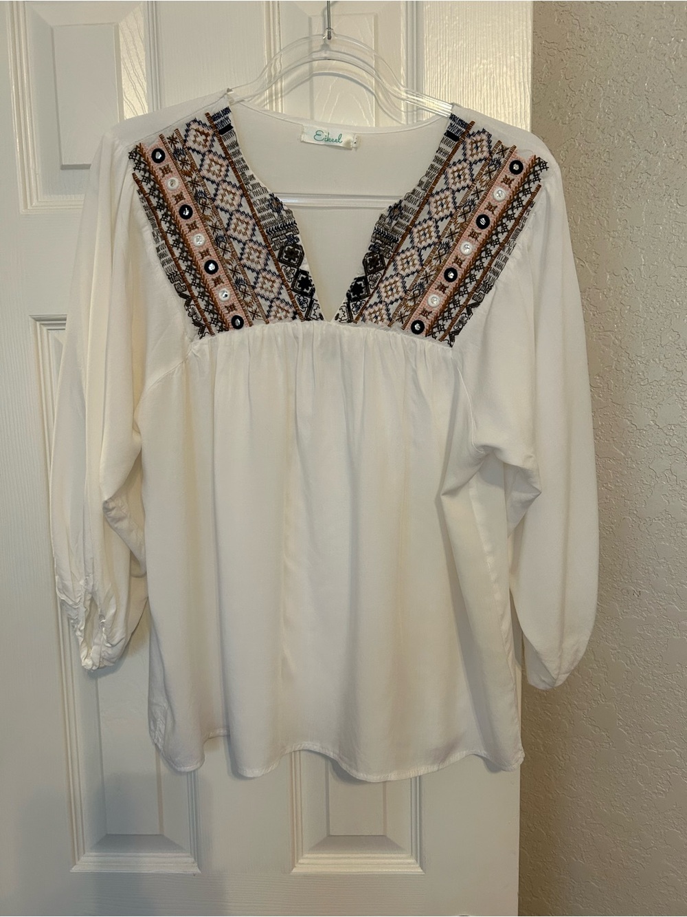 Eikeel White Peasant Blouse with Embroidered V-Neck